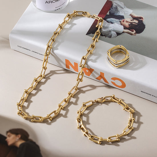 Topshop 8 pack of mixed chain rings in gold